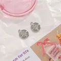 Silver 10mm circular starburst pendant with white zircons for DIY jewelry making - Starburst Tag with Rhinestone 1pc