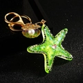 Elegant gold keychain with translucent green starfish and pearl shell charms - Single OPP Bag Packaging / Green Jelly Small Starfish