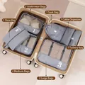 Grey 10-piece travel luggage organizer set with mesh panels and portable handles - Gray 10-Piece Set
