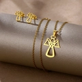 Golden stainless steel angel heart jewelry set with necklace and earrings on a pedestal - Abstract Angel (TZ-446)