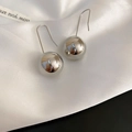 Detail shot of minimalist silver metallic ball dangle earrings on white satin - Mirror Silver Ball Hook (55#)