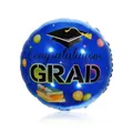Close-up of 18 inch blue foil balloon with graduation hat and book design - 18 Inch Blue Graduation Round