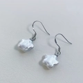 Elegant white star-shaped pearl drop earrings with minimalist metal hooks on leather - Silver Star