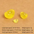 Detailed comparison of three sizes of luminous resin gold ingots on a plain background - Luminous Yellow