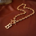 Collier maille grain de café plaqué or avec pendentif lettre B et fermoir à bascule - Chaîne Groin de Porc Lettre B Dorée (55#)