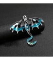 Detailed close-up of a dragon brooch with blue enamel wings and green gemstone accents - Blue