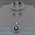 Silver jewelry set with black clover pendants featuring long tassel earrings and necklace - Long Tassel 2-Piece Set / Silver