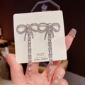 Sparkling silver bow knot earrings with long tassels and inlaid white rhinestones - Bowknot Zircon Tassel (E0249)