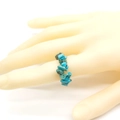 Bohemian style elastic ring featuring natural turquoise stone chips in sky blue color - Turquoise