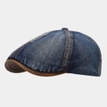 Detail der gewaschenen Jeans-Schirmmütze mit dunkelblauem Stoff und braunem Lederrand - Einheitsgröße / Dunkelblau