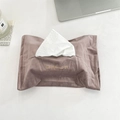 Velvet tissue pouch with gold happiness embroidery on a minimalist desktop setting - Nude Pink