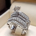 Elegant silver stacked wedding ring set with micro-pave cubic zirconia and round center stone - US 7 / Silver