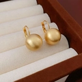 Minimalist matte gold ball lever-back earrings featuring a brushed texture finish - Matte Golden