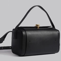 Sac Boston classique en cuir noir avec boucle dorée, poignée et bandoulière réglable - Noir