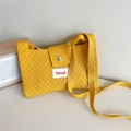 Detail of yellow knitted crossbody bag with diamond texture and magnetic snap button - Yellow