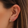 Chic gold star ear cuff set with sparkling zircons worn on a model's ear - Gold Left Series Stars Ear Hook Style (G008)