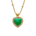 Detail of gold chain necklace featuring a green heart pendant with white crystal halo - Green Heart with Diamonds