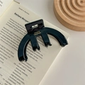Dettaglio molletta per capelli in acetato nero lucido con scritte dorate France Handmade - Nero