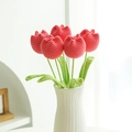 Handmade crochet bouquet with five vibrant red tulips in a white ceramic vase - Plump Tulip Dark Pink