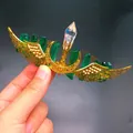 Handmade gold winged headpiece with deep green crystals and iridescent center stone - Dark Green Crystal + Gold Wing Moon
