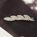 Elegante fermaglio per capelli a foglia d'argento con brillanti strass di cristallo - Foglia