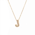 Detailed close-up of gold-plated letter J necklace with micro-paved sparkling zircon stones - Letter J