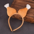 Dettaglio del cerchietto con cosce di tacchino in peluche per feste di ringraziamento - Fascia per Coscia di Pollo