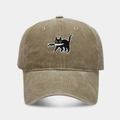 Close-up of a khaki washed cotton baseball cap with a black cat holding a knife embroidery - Adjustable / Khaki