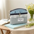 Gray striped coin purse with floral pattern and lace trim on a wooden table - Blue Dandelion Coin Purse