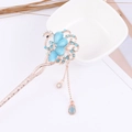 Peacock flower hair stick in rose gold with blue gemstones and dangling tassels - Rose Gold Peacock Blue Gem Tassel (FZ041)