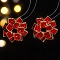 Elegant gold earrings with square-cut red zircon stones in a floral circular design - Red (STE022GL-R)
