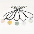 Set of five heart-shaped natural crystal pendant necklaces in various quartz colors - Topaz