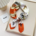 Elegant orange and white floral silk scarf displayed in a stylish golden picture frame - Orange Violin Flower