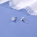 Sparkling S925 sterling silver star stud earrings with zircon inlay in silver finish - 925 Silver / White Gold