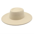 Detailed view of cream-colored wide brim hat stitching and wool felt material texture - Beige