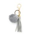 DIY keychain featuring grey faux fur pom pom and grey tassel with golden metal ring - Gray
