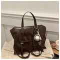 Vintage dark brown faux leather tote backpack featuring a retro metal buckle and sports charm - Coffee With Pendant
