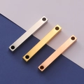 Colgantes rectangulares de acero inoxidable pulido en plata, oro y oro rosa con dos agujeros - Tamaño 5x40mm (MP025) / Oro de 18K