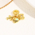 Detailed view of gold travel charms featuring an airplane, heart tag, and suitcase - Travel World - Light Blue Heart (ZYN-DME895G-3)