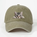 Close-up of olive green baseball cap featuring a detailed tabby cat graphic and twill texture - One Size / Khaki