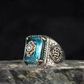 Vintage silver ring featuring a large blue gemstone with gold floral overlay and turquoise beads - US 7 / Blue Rectangle Main Stone