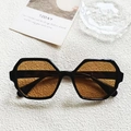 Lunettes de soleil polygonales chic avec monture noire et verres teintés orange - Brun Foncé