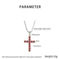 Macro detail of stainless steel cross pendant with red cubic zirconia and dimensions - Red Zirconia (KN296583-CALY)