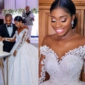 White lace long sleeve wedding dress with off-shoulder neck and pearl embroidery details - US 2 / White