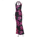 Detail of floral printed two-piece set with halter crop top and slim fit maxi skirt - S / Black