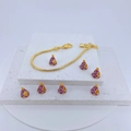 Gold snake chain bracelet with purple and yellow enamel cone charms on white stone - Purple/Gold