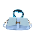 Minimalist light blue box bag with denim texture and metallic liquid-style handle - Blue