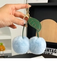 Cute light blue faux rabbit fur cherry keychain with green leaves and golden ring - Sky Blue
