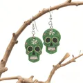 Green sugar skull earrings with floral relief for Halloween and Day of the Dead - Green with Floral Painting