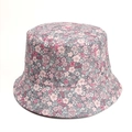 Close-up of floral pattern and stitching detail on a reversible cotton sun bucket hat - Grey Background Pink Purple White Floral (Style O)